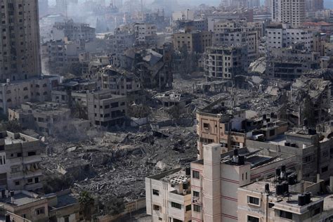 Israeli strikes demolish entire neighborhoods as Gaza power plant runs out of fuel